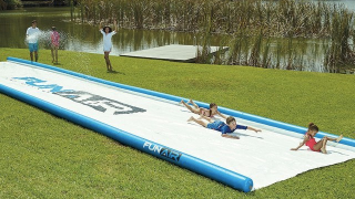 Illustration for article titled You Could Slide a Truck Down This Monstrous 50-Foot Long Slip N' Slide